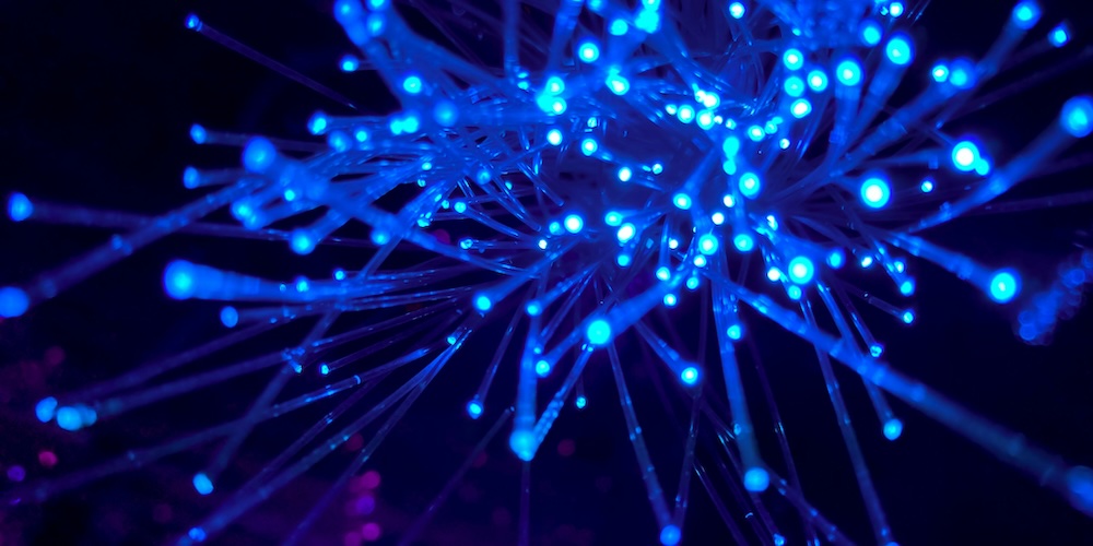 Fiber strands with blue light in the dark